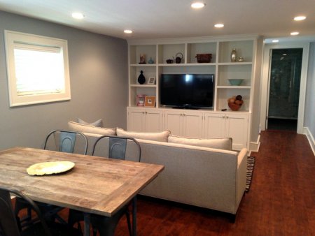 An entertainment area adjacent to a kitchenette in a renovated basement gives this family a private place to relax away from areas guests will normally gather. (Photo courtesy of Angie's List member Christopher Hill, Chicago)